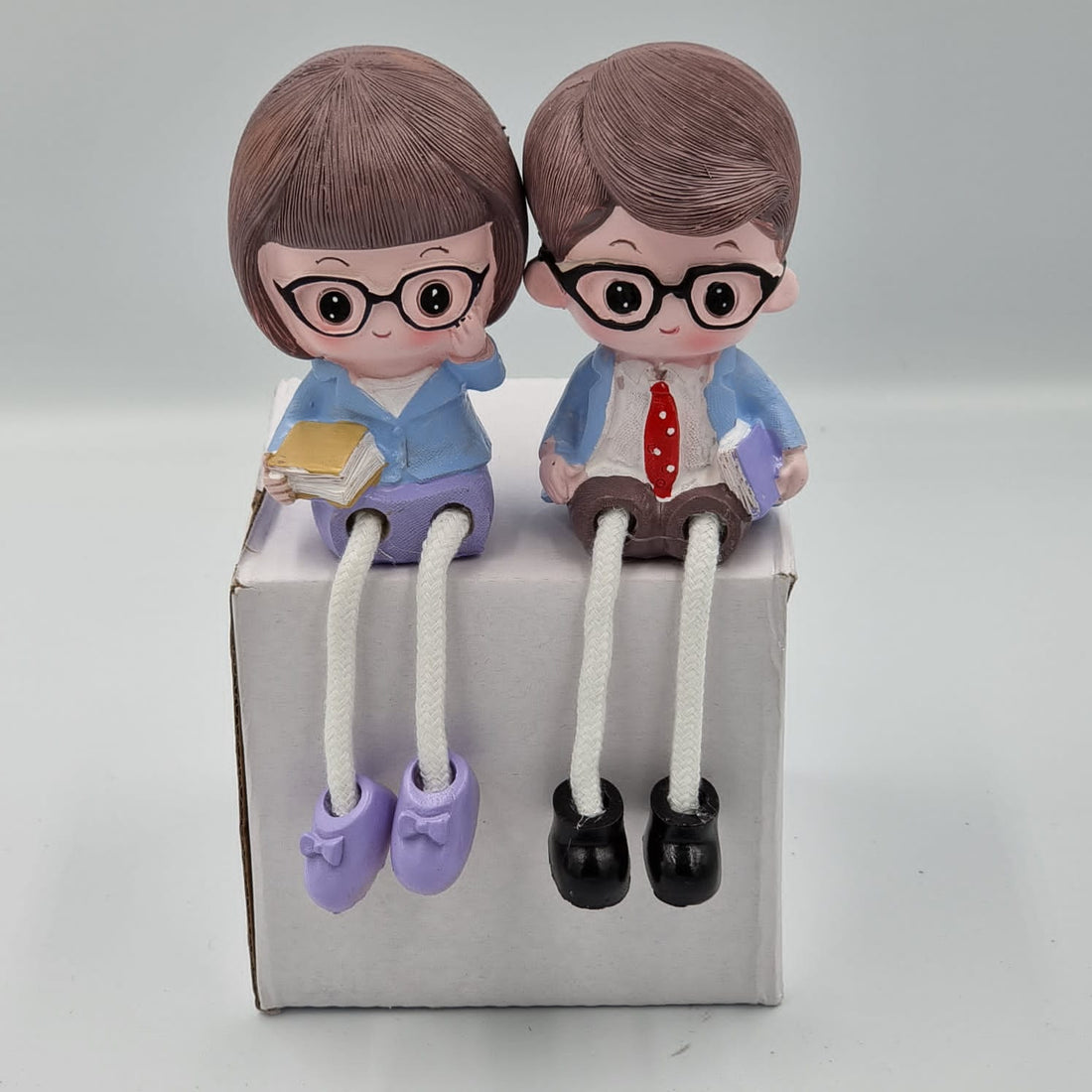 2pcs Couple Hanging Legs Figurines – Mix Design