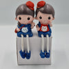 2pcs Couple Hanging Legs Figurines – Mix Design