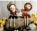 2pcs Couple Hanging Legs Figurines – Mix Design