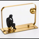 Contemplating Custodian Décor Accent